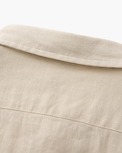Men's Relaxed Long-Sleeve Linen Shirt with Chest Pocket in beige, close-up of the linen weave